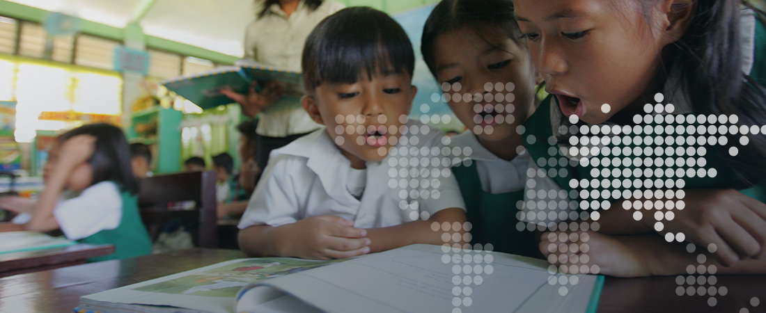 Schoolchildren reading in the Philippines