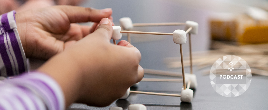 A photo of a child engaged in scientific activity 