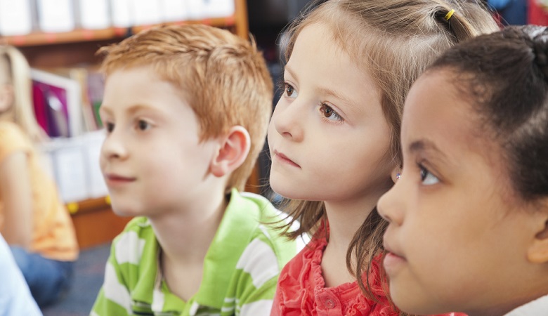 A photo of children in a classroom