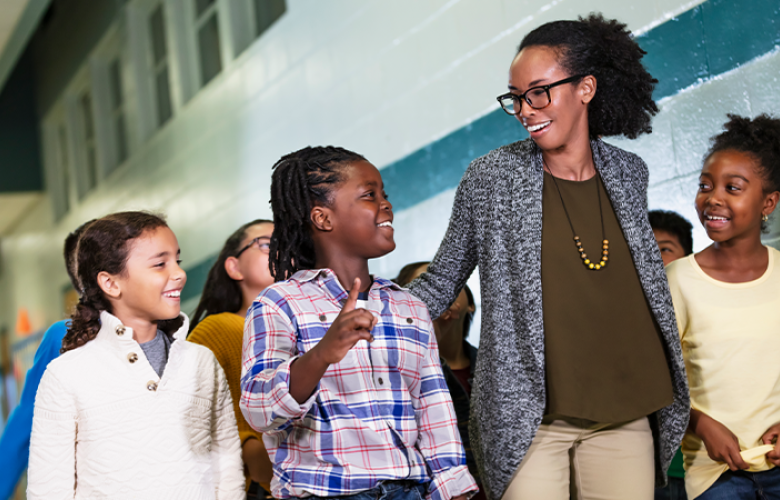 A photo of students and teachers representing Bringing an Equity Lens to Supporting Students’ Well-Being