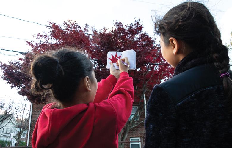 An image of parent and child representing 3 Great Science Activities for Fall