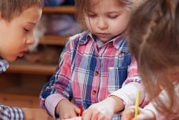 A photo of young children playing.