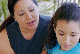 A mother talking with her daughter