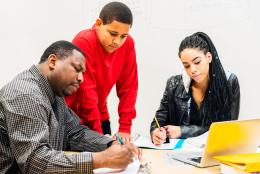 A photo of a mentor and students representing Making Computer Science Mentorship Work