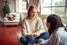 A photo of a parent and child representing 5 Ways to Help Children Cope with Coronavirus Anxiety