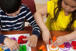 A photo of children using blocks representing New EDC Study to Advance Knowledge of Children’s Math and Spatial Learning 