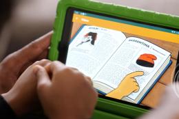 A child using a tablet representing Conducting Research That Is Both Rigorous and Culturally Responsive