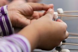 A photo of a child engaged in scientific activity 